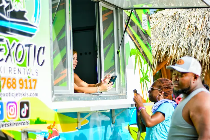 The TH Exotic rental booth on the riverbank