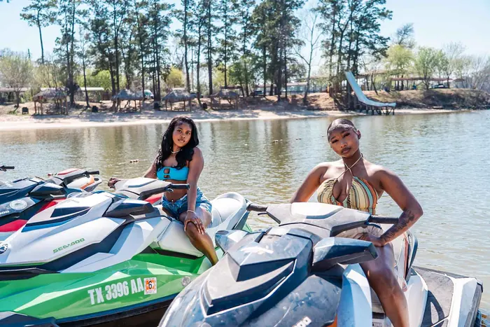 Two riders with Sea-Doo jet skis on the San Jacinto River