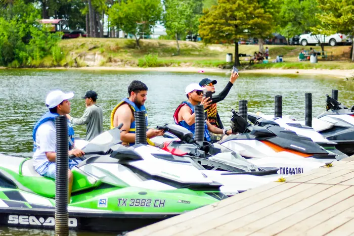 The full TH Exotic jet ski fleet at the dock