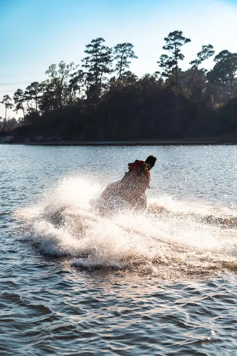 Jet ski carving a hard turn through the spray